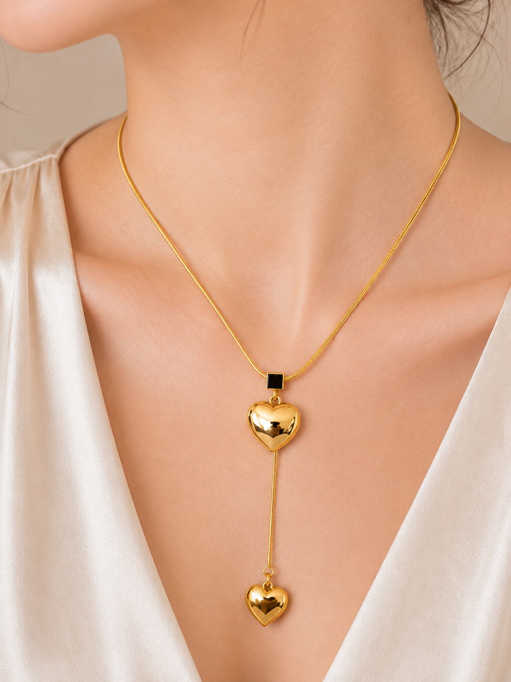 The Liquid Gold Dual Heart Lariat