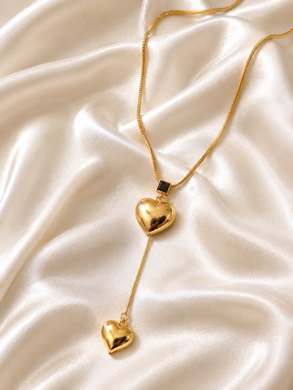 The Liquid Gold Dual Heart Lariat